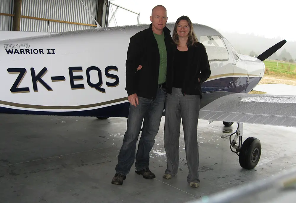 Richard, Lisa and Piper Warrior in hangar