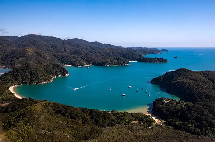 Yachts anchored in picturesque Anchorage, Abel Tasman viewed from scenic flight